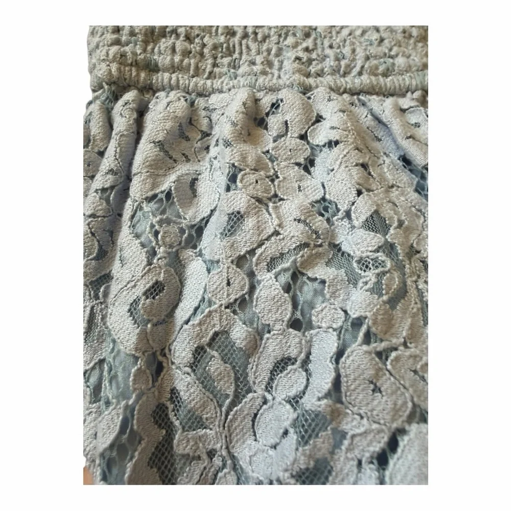 Jessika’s 0-3 Mos Baby Blue Smocked‎ Lace Romper